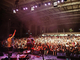 Rockhampton concert with large audience in background, band in foreground