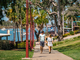 Young couple walk through history riverwalk in Rockhampton