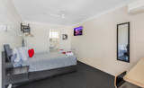 Large standard queen room offers a comfortable stay in a studio unit.